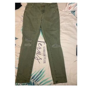Ripped green jeans